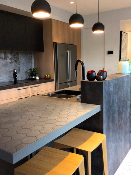 A modern kitchen used Marmox Australia boards as countertop backing material